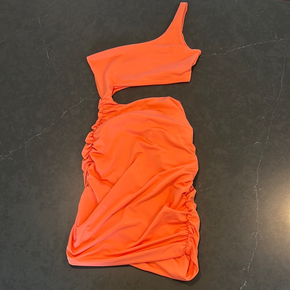 Flattering cut out one shoulder mini dress